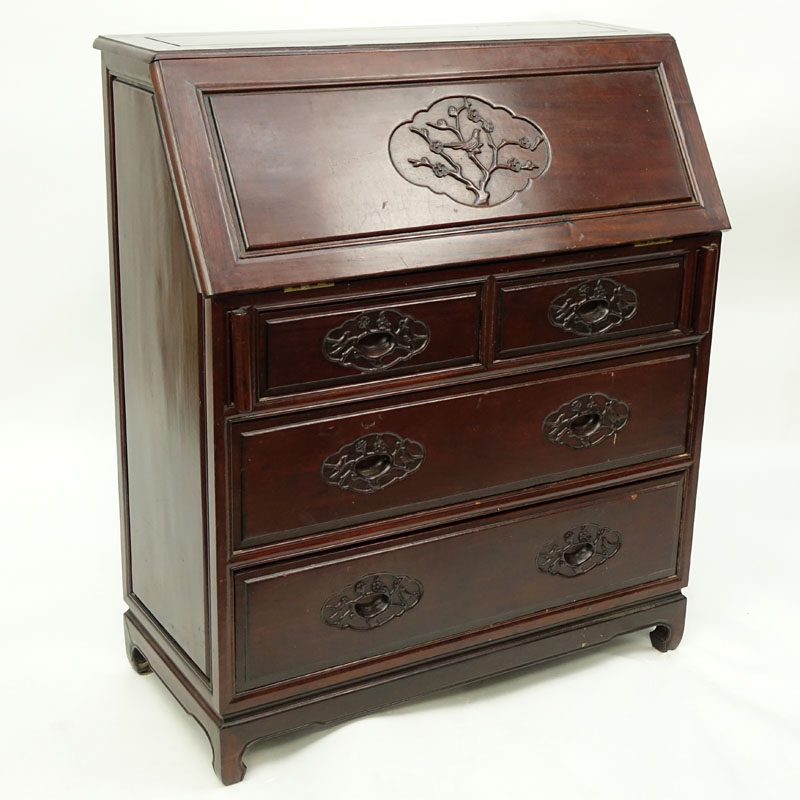 Mid Century Chinese Slant Top Desk. Carved bird relief to front of slant door and 4 drawers, interior storage and compartments.