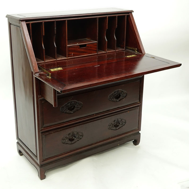 Mid Century Chinese Slant Top Desk. Carved bird relief to front of slant door and 4 drawers, interior storage and compartments.