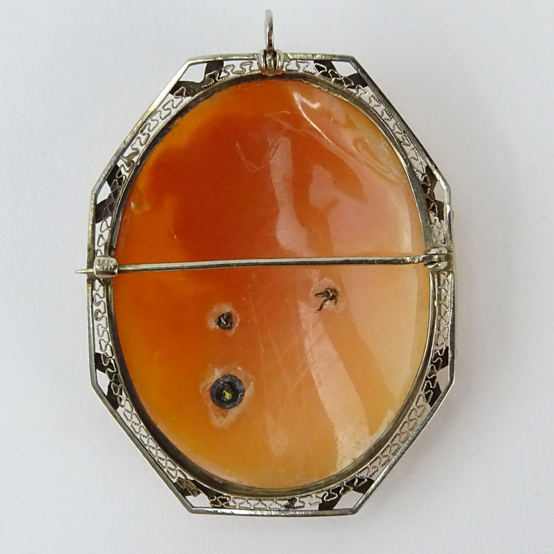 Vintage 14 Karat Yellow Gold Filigree Mounted Carved Shell Cameo and Diamond Pendant Brooch.