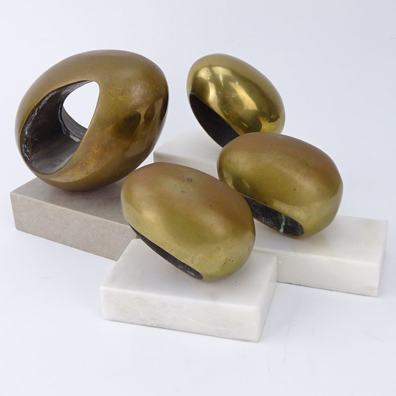 Grouping of Four (4) Modern Bronze Pierced Egg Shaped Sculptures. Largest Measures Approx.