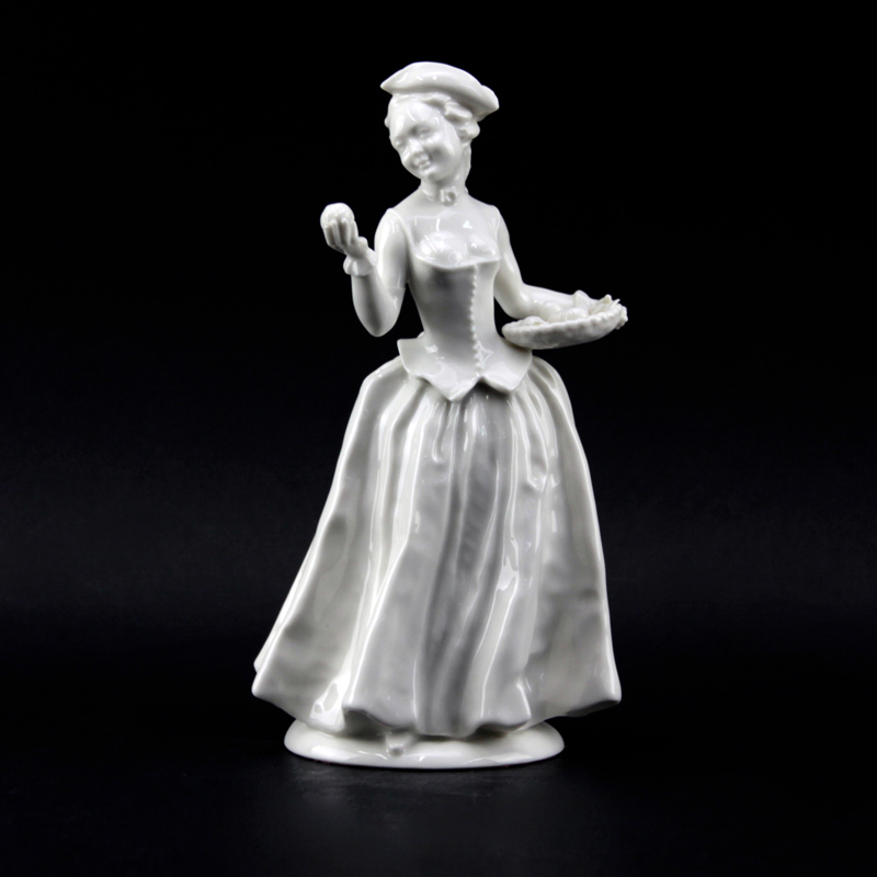 Vintage Hutschenreuther Figurine "Woman With Fruit". 