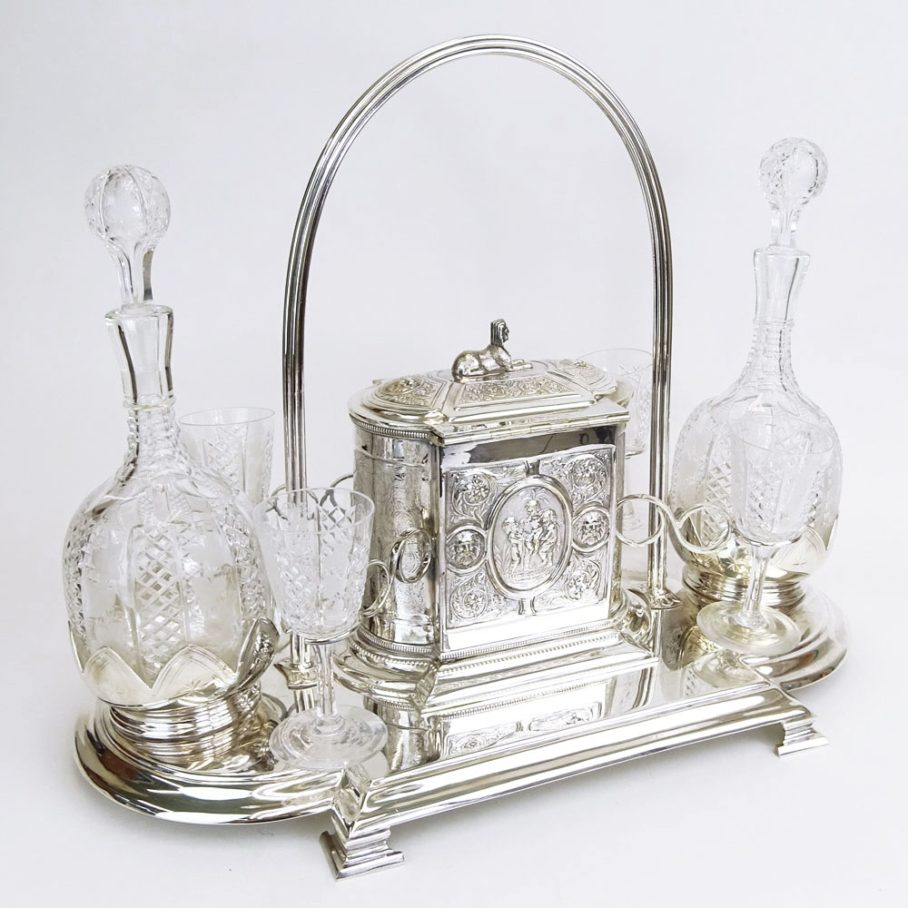 Fine Antique English Silverplate and Crystal Seven (7) Piece Decanter Set with Biscuit Box.