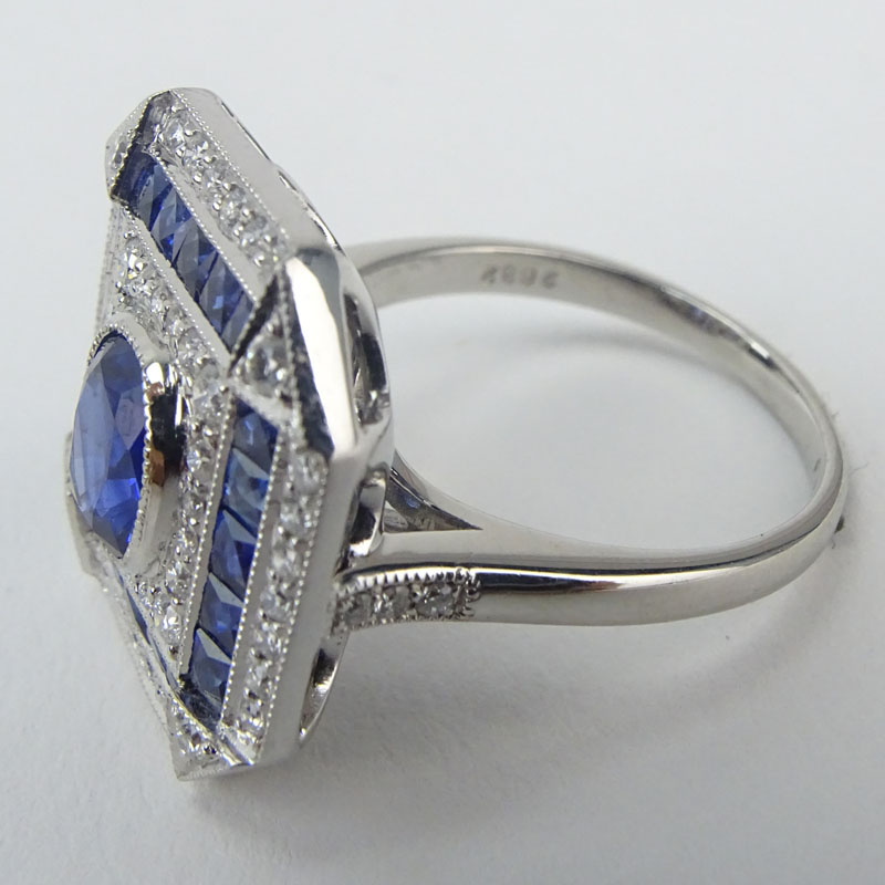 Approx. 2.10 Carat Sapphire, .45 Carat Diamond and Platinum Ring.