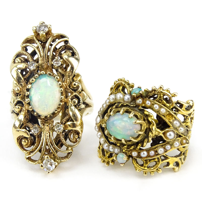 Two Vintage 14 Karat Yellow Gold and Opal Rings, One with Diamond accents, One with seed pearl accents. 