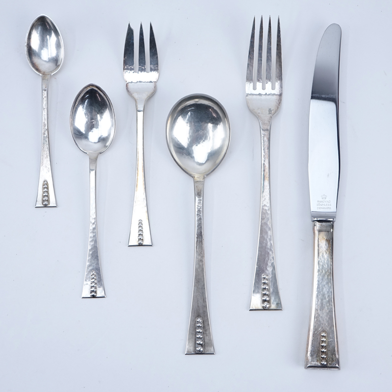 Seventy Two (72) Pieces Carl Poul Petersen Sterling Silver Flatware.