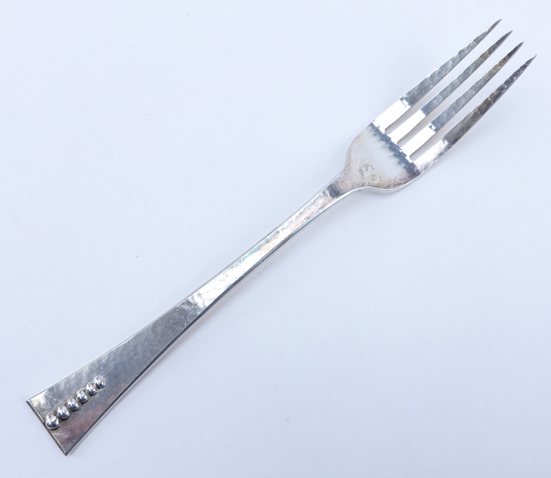 Seventy Two (72) Pieces Carl Poul Petersen Sterling Silver Flatware.