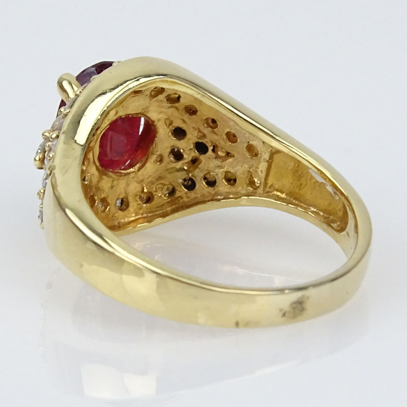 Vintage Oval Cut Ruby, Diamond and 14 Karat Yellow Gold Ring..