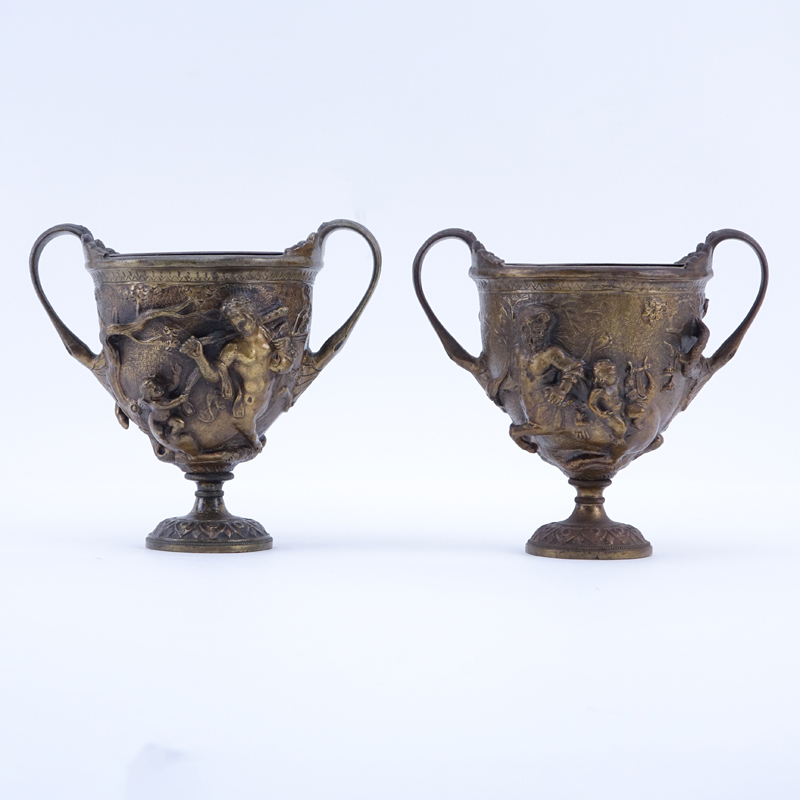 Two (2) Small Bronze Figural Urns.