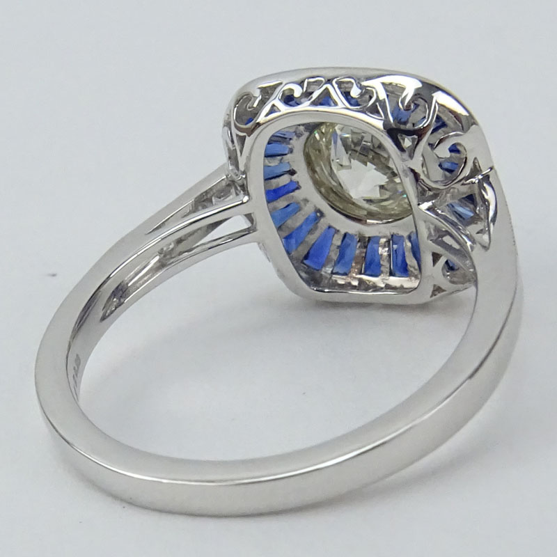 Approx. .95 Carat Old European Cut Diamond, .87 Carat Calibre Cut Sapphire and Platinum Ring..