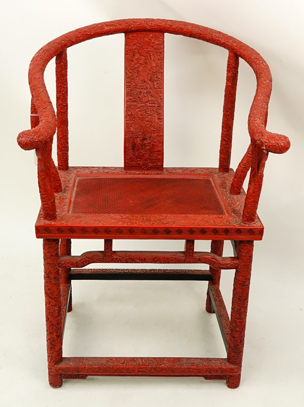 Late 19th or Early 20th Century Chinese Cinnabar Lacquer Chair with Horseshoe Back.