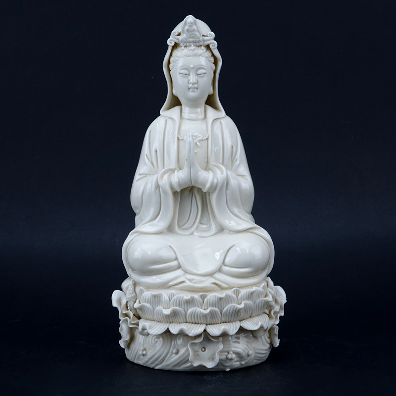 Chinese Porcelain Seated Kwan Yin Figurine.