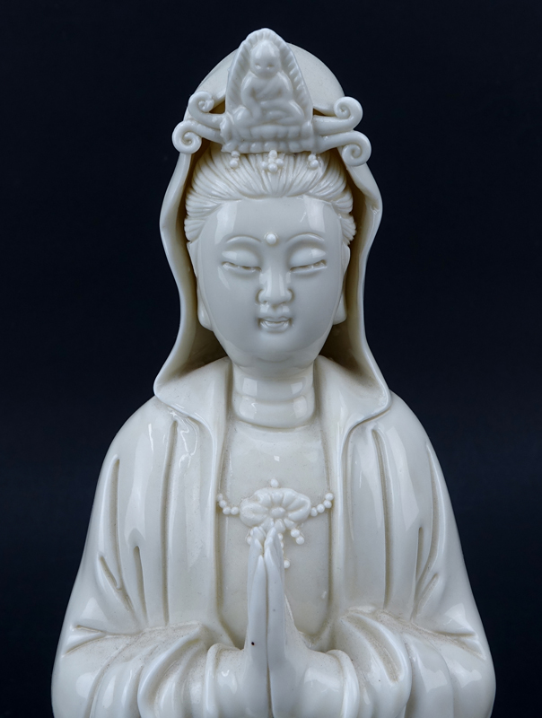 Chinese Porcelain Seated Kwan Yin Figurine.