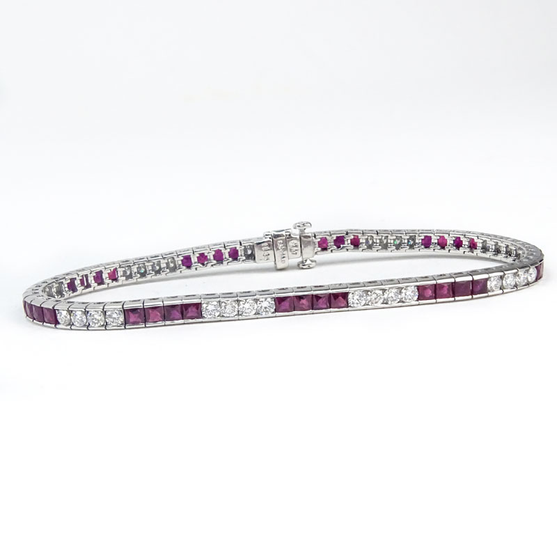 Approx. 3.82 Carat Calibre Cut Ruby, 1.76 Carat Round Brilliant Cut Diamond and Platinum Bracelet. .