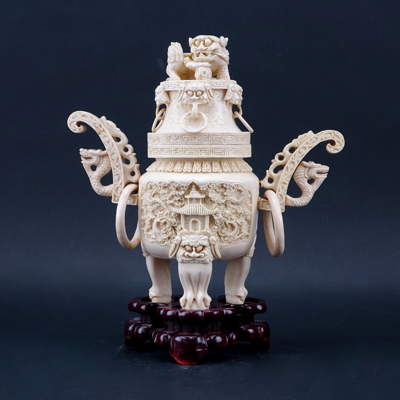 Vintage Faux Ivory Lidded Vessel. Features dragon ring handles, foo dog finial. 