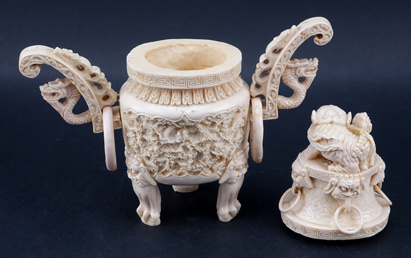 Vintage Faux Ivory Lidded Vessel. Features dragon ring handles, foo dog finial. 
