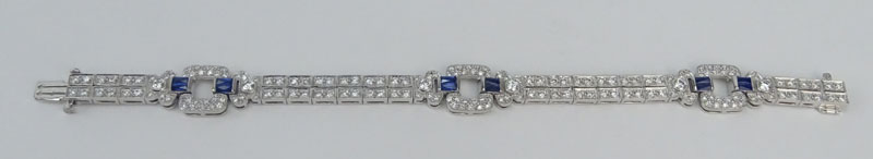 Art Deco style Approx. 3.04 Carat Pave Set Round Brilliant Cut Diamond, 1.07 Carat Sapphire and Platinum Bracelet. .