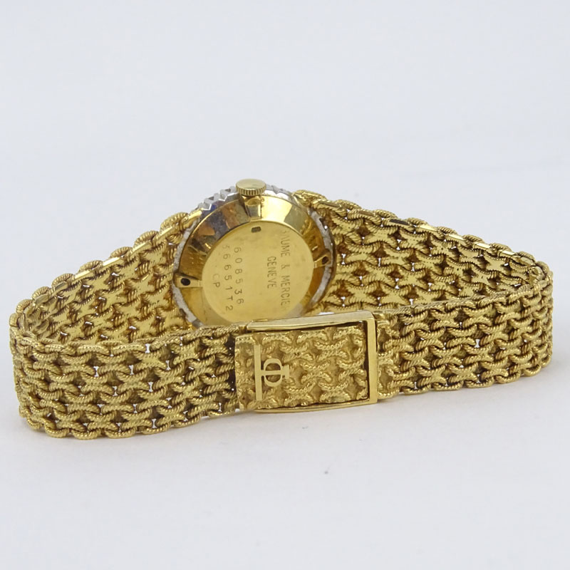 Lady's Vintage Baume & Mercier Genève 18 Karat Yellow Gold Bracelet Watch.