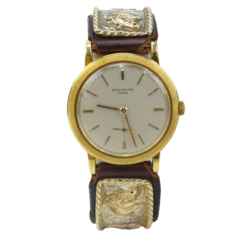 Vintage Patek Philippe 18 Karat Yellow Gold Automatic Movement Watch.