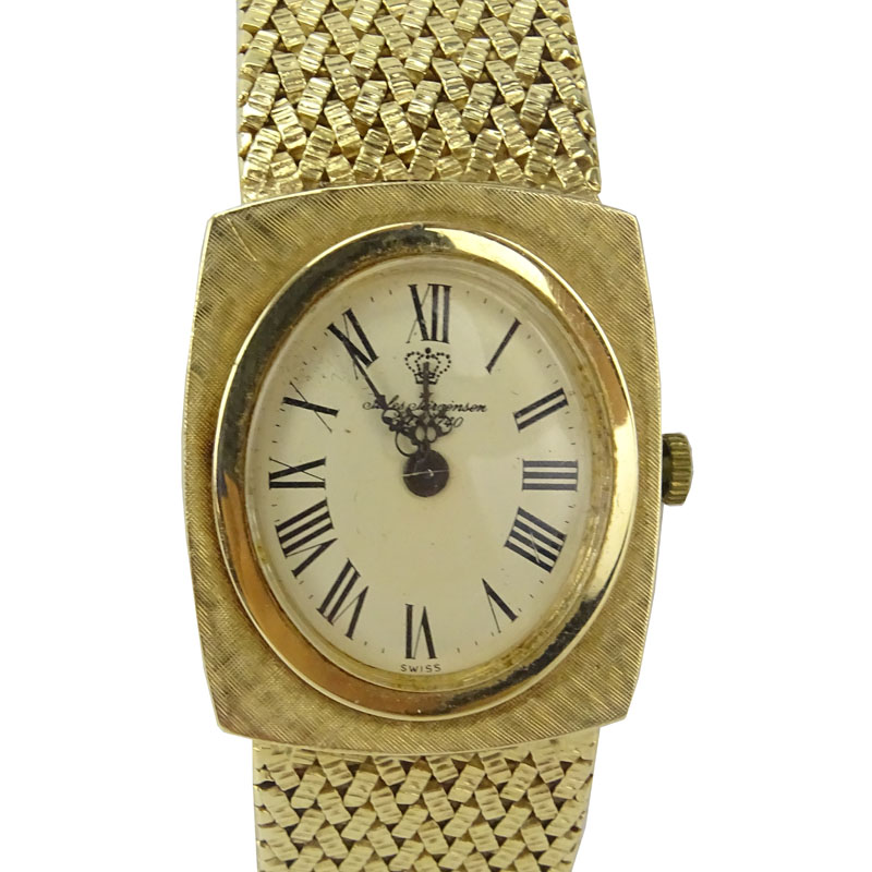 Man's Vintage Jules Jurgensen 14 Karat Yellow Gold Bracelet Watch with Manual Movement.