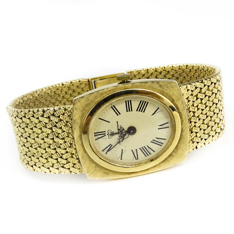 Man's Vintage Jules Jurgensen 14 Karat Yellow Gold Bracelet Watch with Manual Movement.