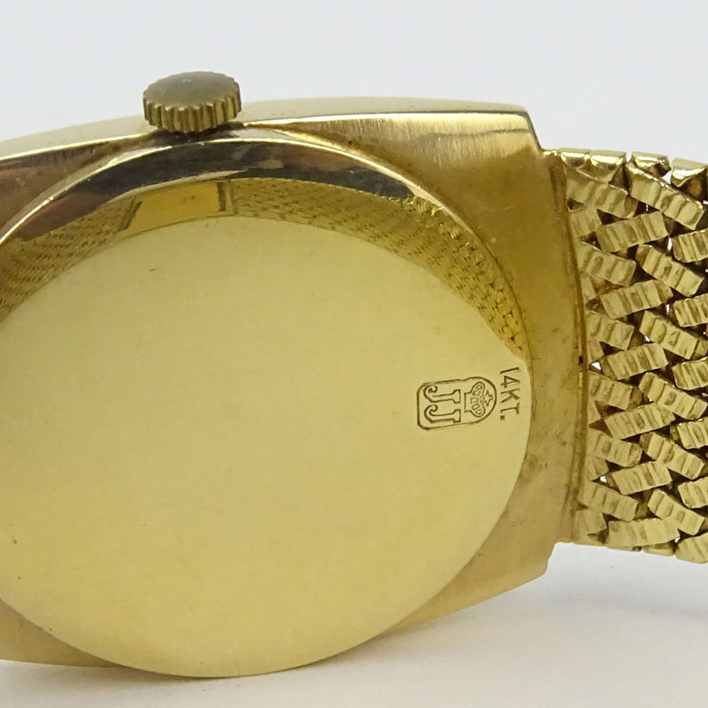 Man's Vintage Jules Jurgensen 14 Karat Yellow Gold Bracelet Watch with Manual Movement.