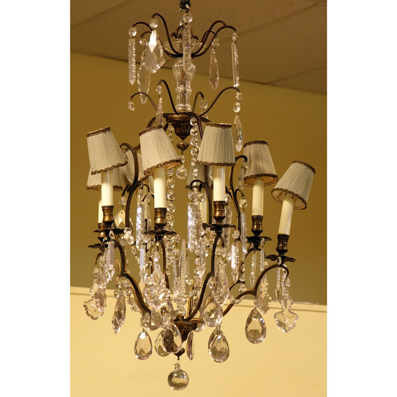 Mid Century Crystal and Brass Eight Light Chandelier with hanging Prism.