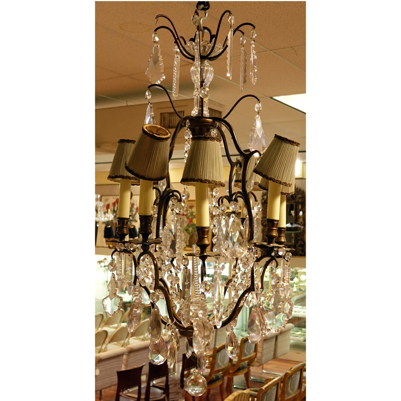 Mid Century Crystal and Brass Eight Light Chandelier with hanging Prism.