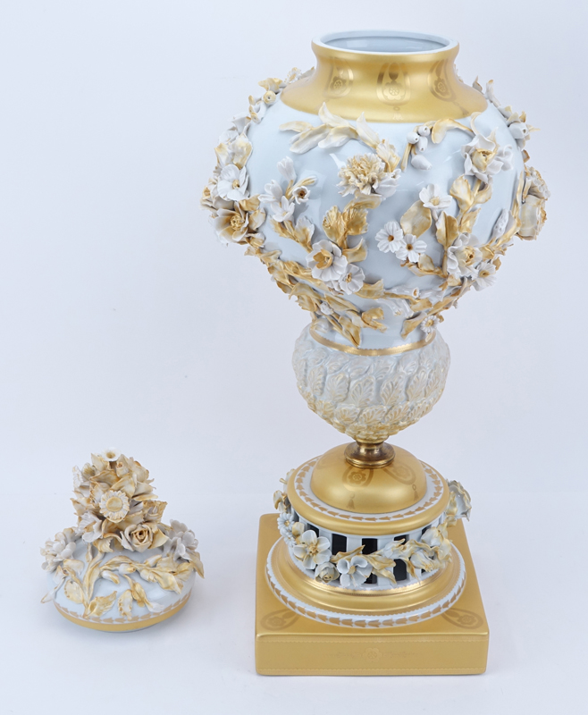 Very Large Mangani Italian Porcelain Covered Urn With Applied Flowers. Reticulated base, gilt decoration and highlights. 