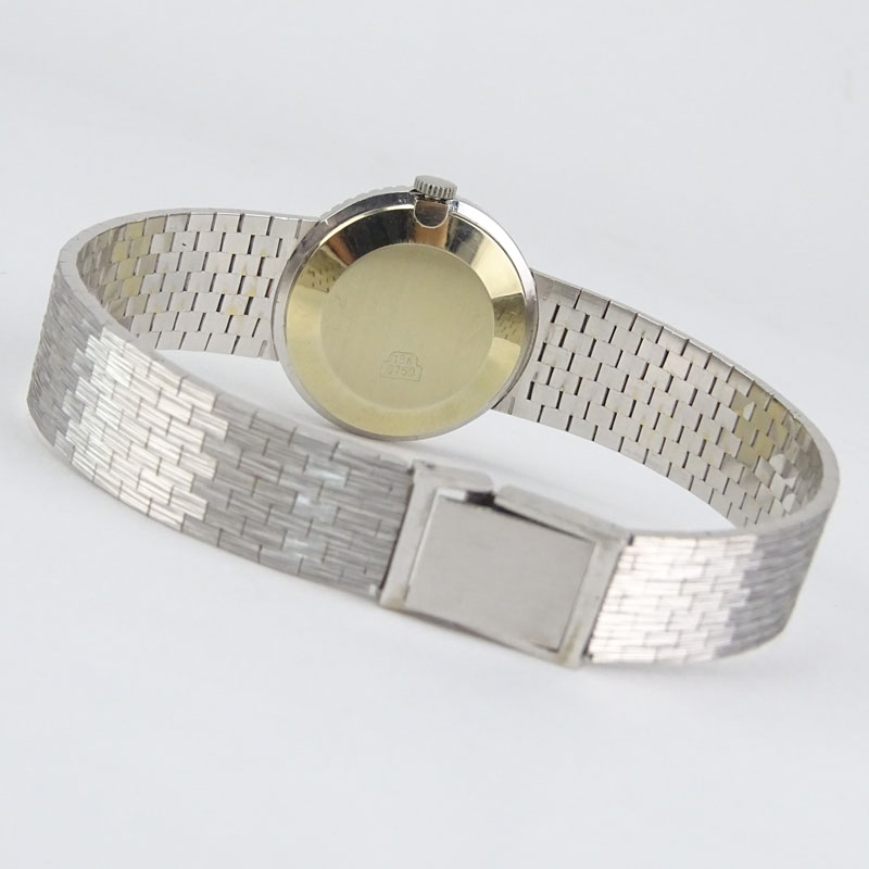 Lady's Vintage Zenith 18 Karat White Gold Bracelet watch with Diamond Bezel.