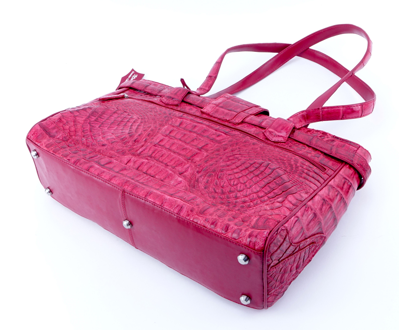 Nina Raye Red Crocodile Satchel. Suede interior with numerous pockets. Magnetic closure.