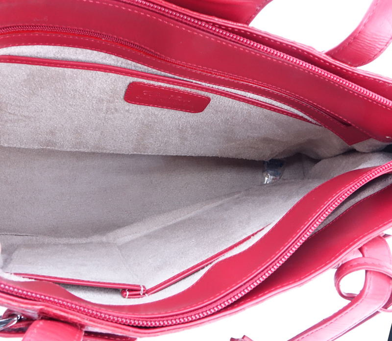 Nina Raye Red Crocodile Satchel. Suede interior with numerous pockets. Magnetic closure.