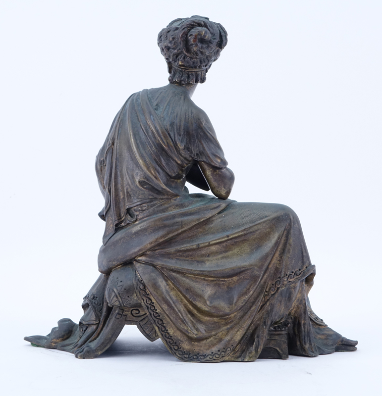 Antique Bronze Sculpture Of A Woman.