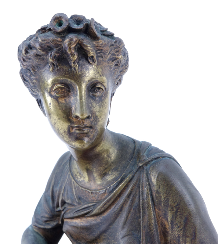 Antique Bronze Sculpture Of A Woman.