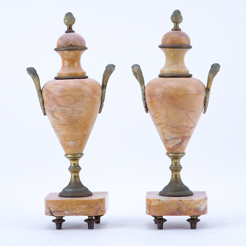 Pair of French Bronze Mounted Pink Marble Urns.