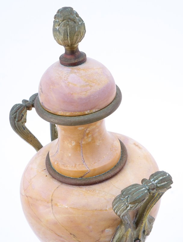 Pair of French Bronze Mounted Pink Marble Urns.