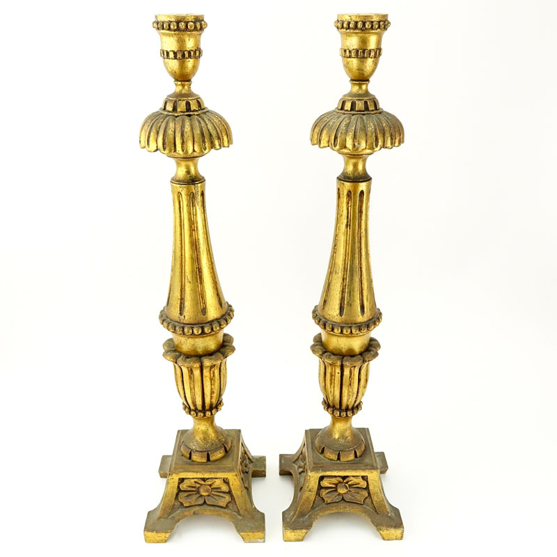 Pair of Tall Louis XVI Style Carved Gilt Wood Candlesticks.