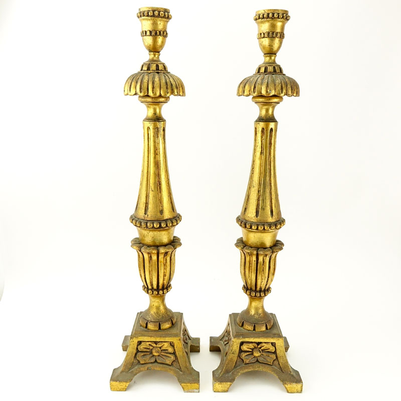 Pair of Tall Louis XVI Style Carved Gilt Wood Candlesticks.