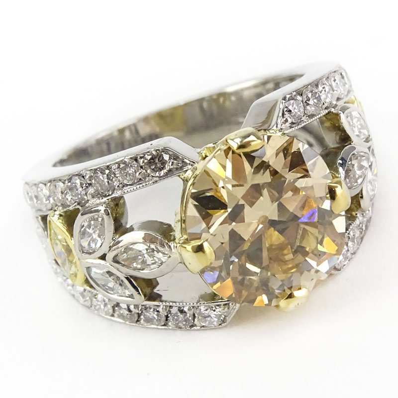 GIA Certified 4.04 Carat Fancy Brownish Yellow Diamond and Platinum Engagement Ring .