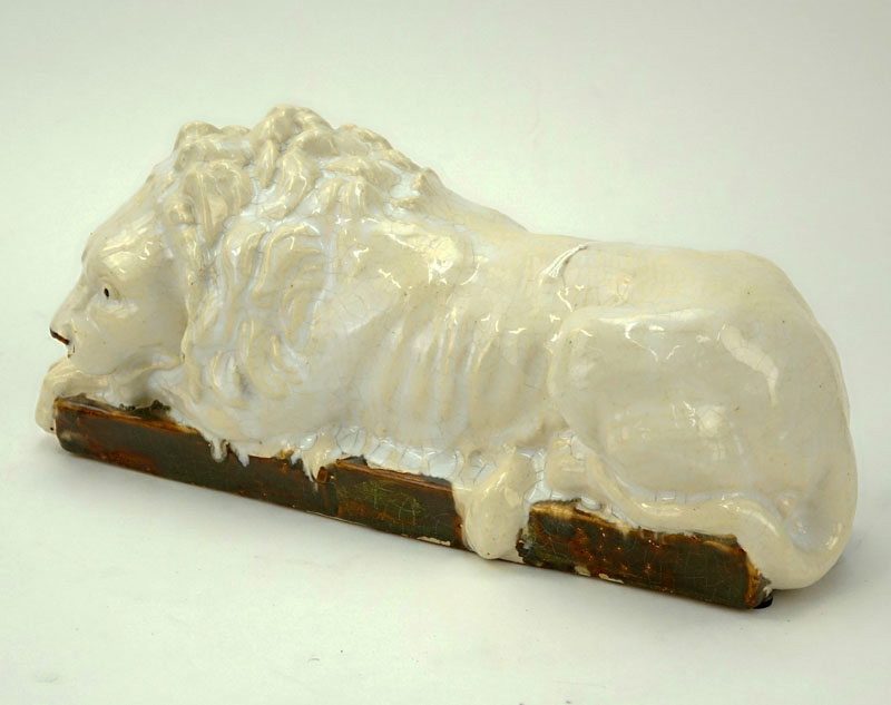 Glazed Porcelain Lion Sculpture Modeled After Antonio Canova.