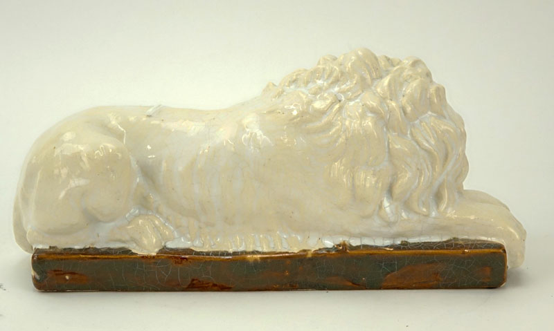 Glazed Porcelain Lion Sculpture Modeled After Antonio Canova.