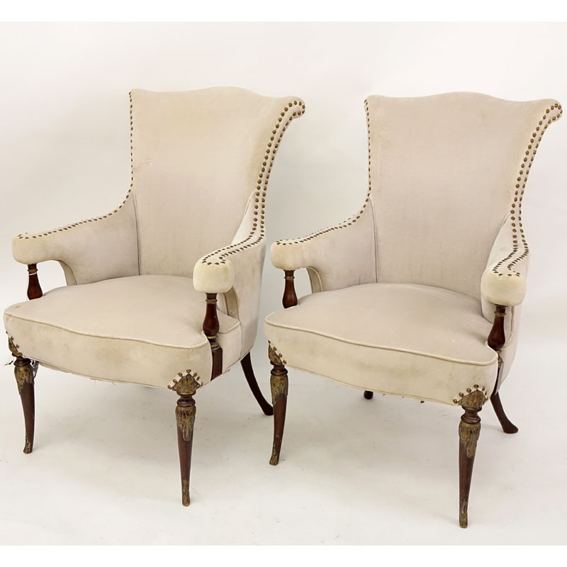 Pair of Mid Century Carved Mahogany and Upholstered Gainsborough Armchairs.