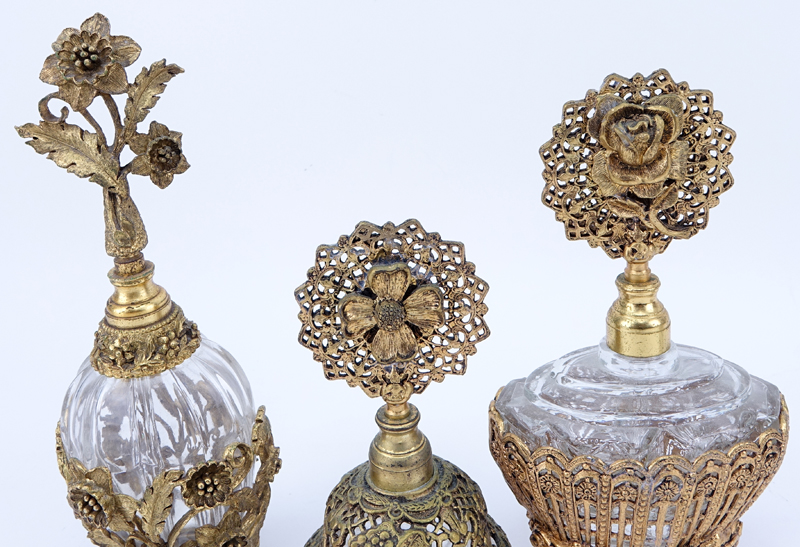 Collection of Five (5) Vintage Bronze/Brass Mounted Glass Perfume Bottles.