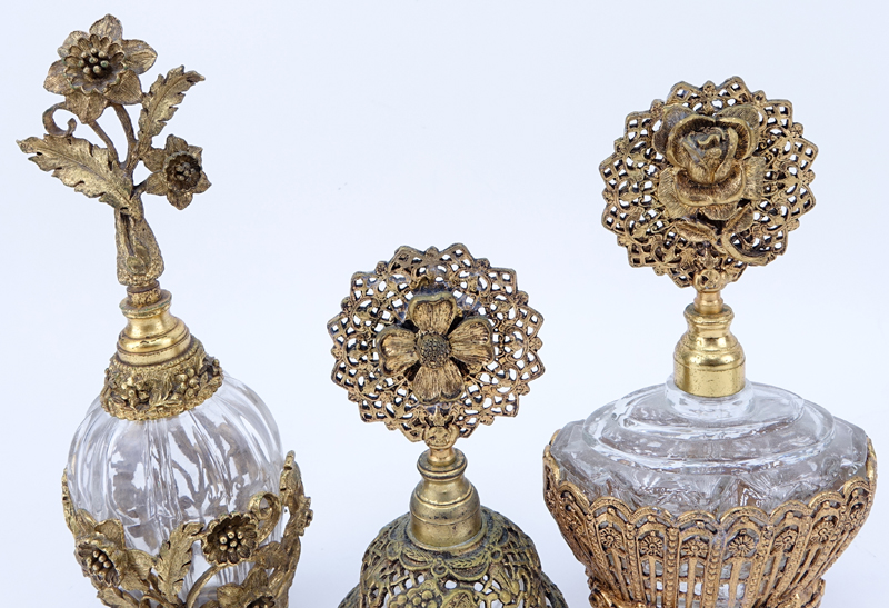 Collection of Five (5) Vintage Bronze/Brass Mounted Glass Perfume Bottles.