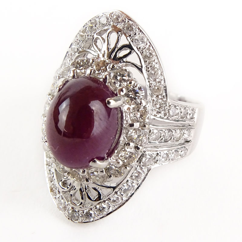 Approx. 4.0 Carat Cabochon Ruby, 2.0 Carat Round Brilliant Cut Diamond and 18 Karat White Gold Ring. 