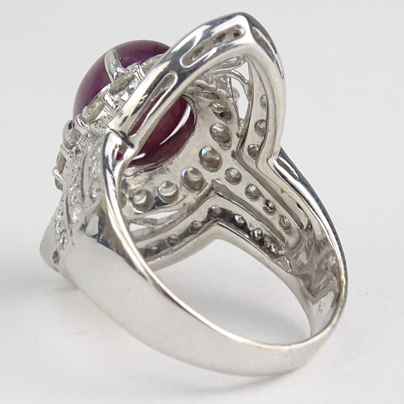 Approx. 4.0 Carat Cabochon Ruby, 2.0 Carat Round Brilliant Cut Diamond and 18 Karat White Gold Ring. 