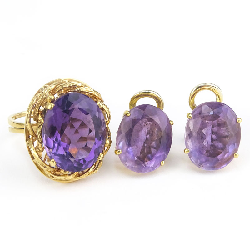 Vintage Oval Cut Amethyst and 18 Karat Yellow Gold Ring and Earring Suite.