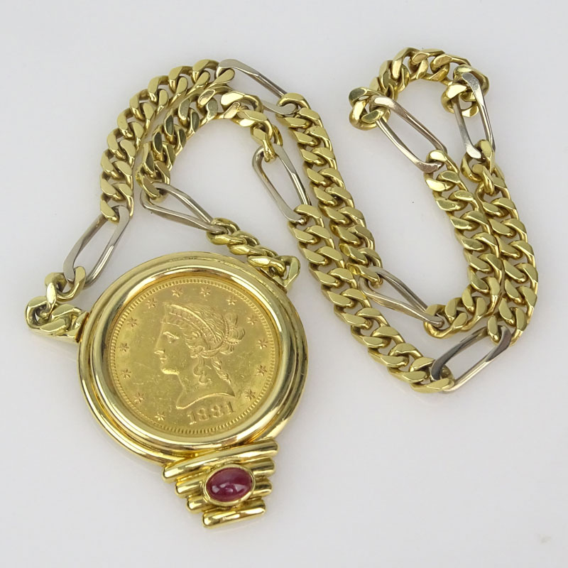 US 1881 $10 Liberty Head Gold Coin Pendant Necklace with 18 Karat Yellow Gold Bezel and Chain and with Cabochon Ruby Accent.