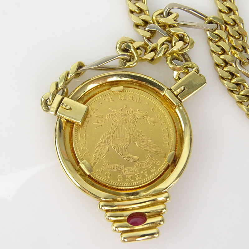 US 1881 $10 Liberty Head Gold Coin Pendant Necklace with 18 Karat Yellow Gold Bezel and Chain and with Cabochon Ruby Accent.