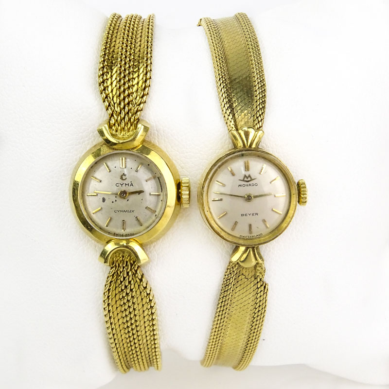 Lady's Vintage 18 Karat Yellow Gold Movado Bracelet Watch together with Vintage Cyma 18 Karat yellow Gold Bracelet watch.