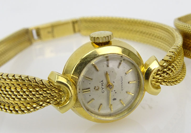 Lady's Vintage 18 Karat Yellow Gold Movado Bracelet Watch together with Vintage Cyma 18 Karat yellow Gold Bracelet watch.